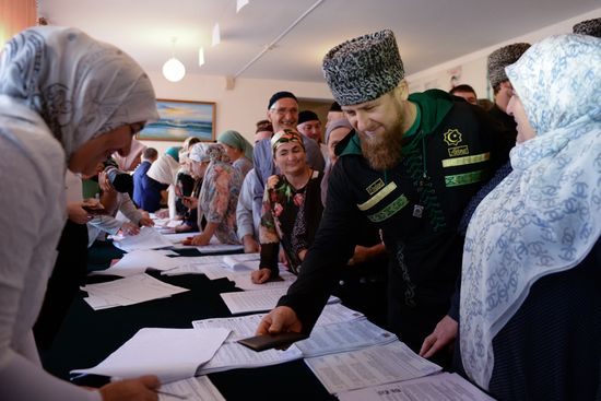 Public and political leaders vote on general election day