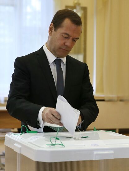 Prime Minister Dmitry Medvedev votes on general election day