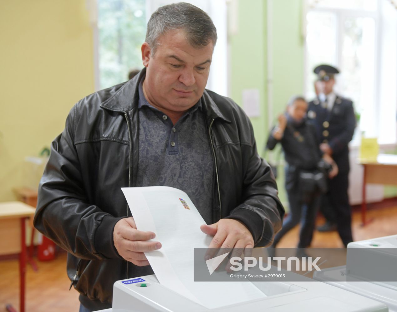 Public and political leaders vote on general election day