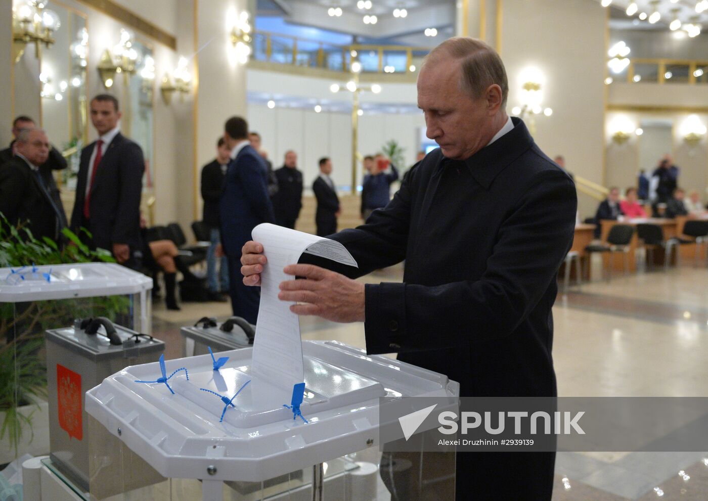 President Vladimir Putin votes on general election day
