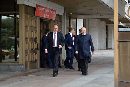 President Vladimir Putin votes on general election day