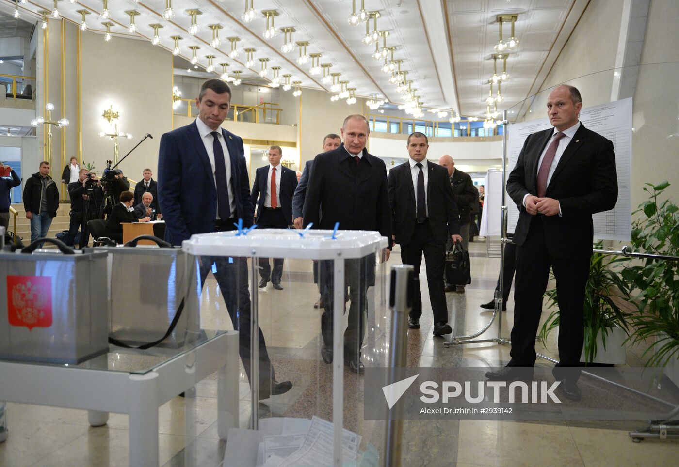 President Vladimir Putin votes on general election day