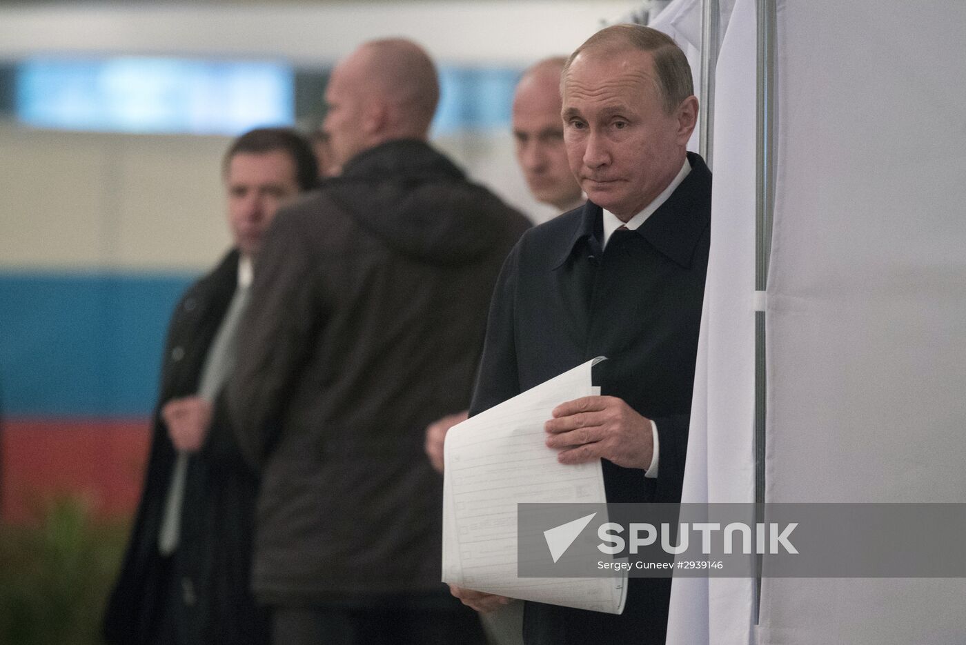 President Vladimir Putin votes on general election day