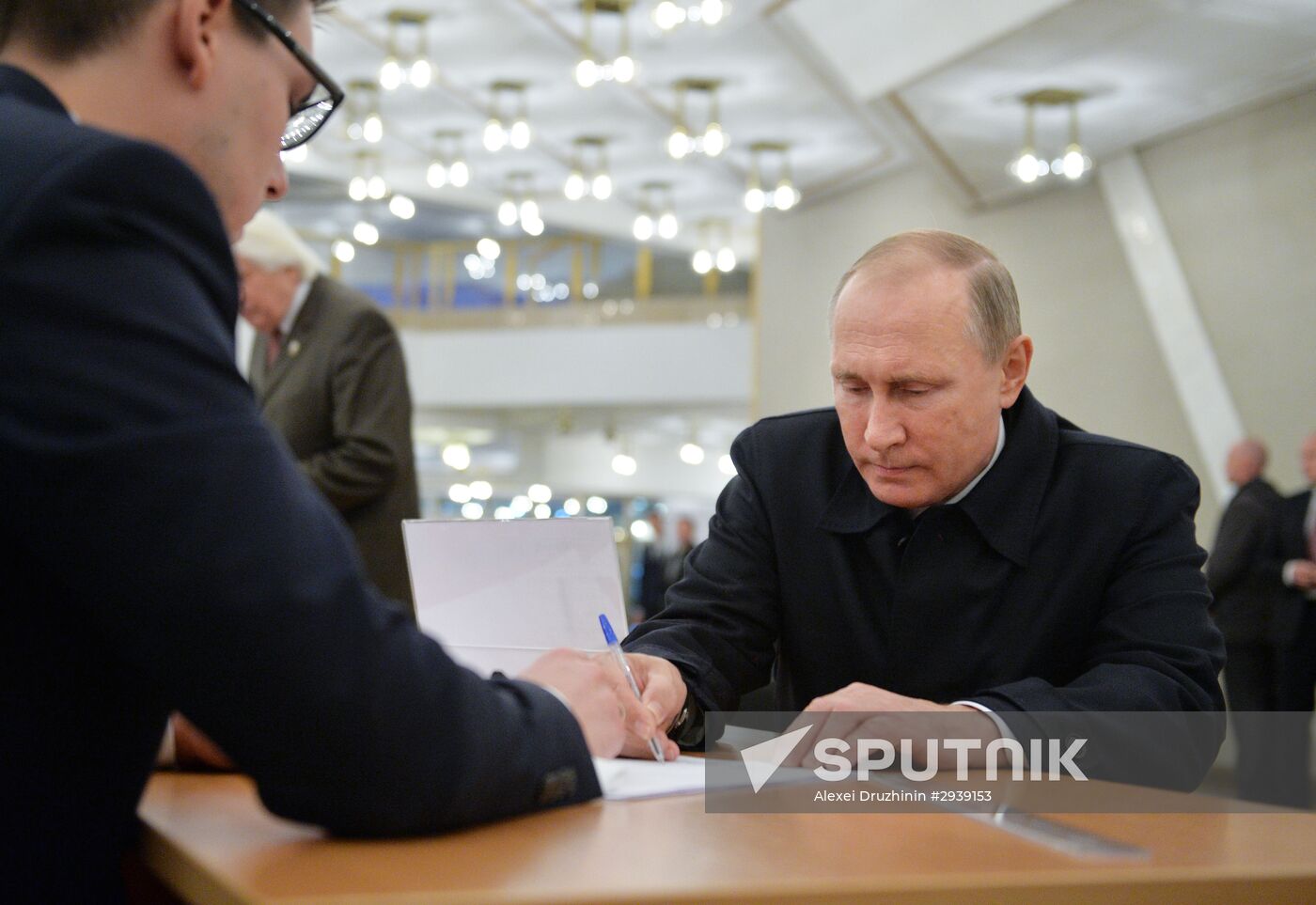 President Vladimir Putin votes on general election day