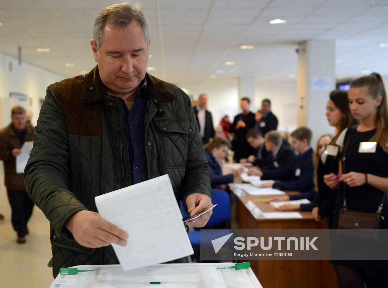 Public and political leaders vote on general election day