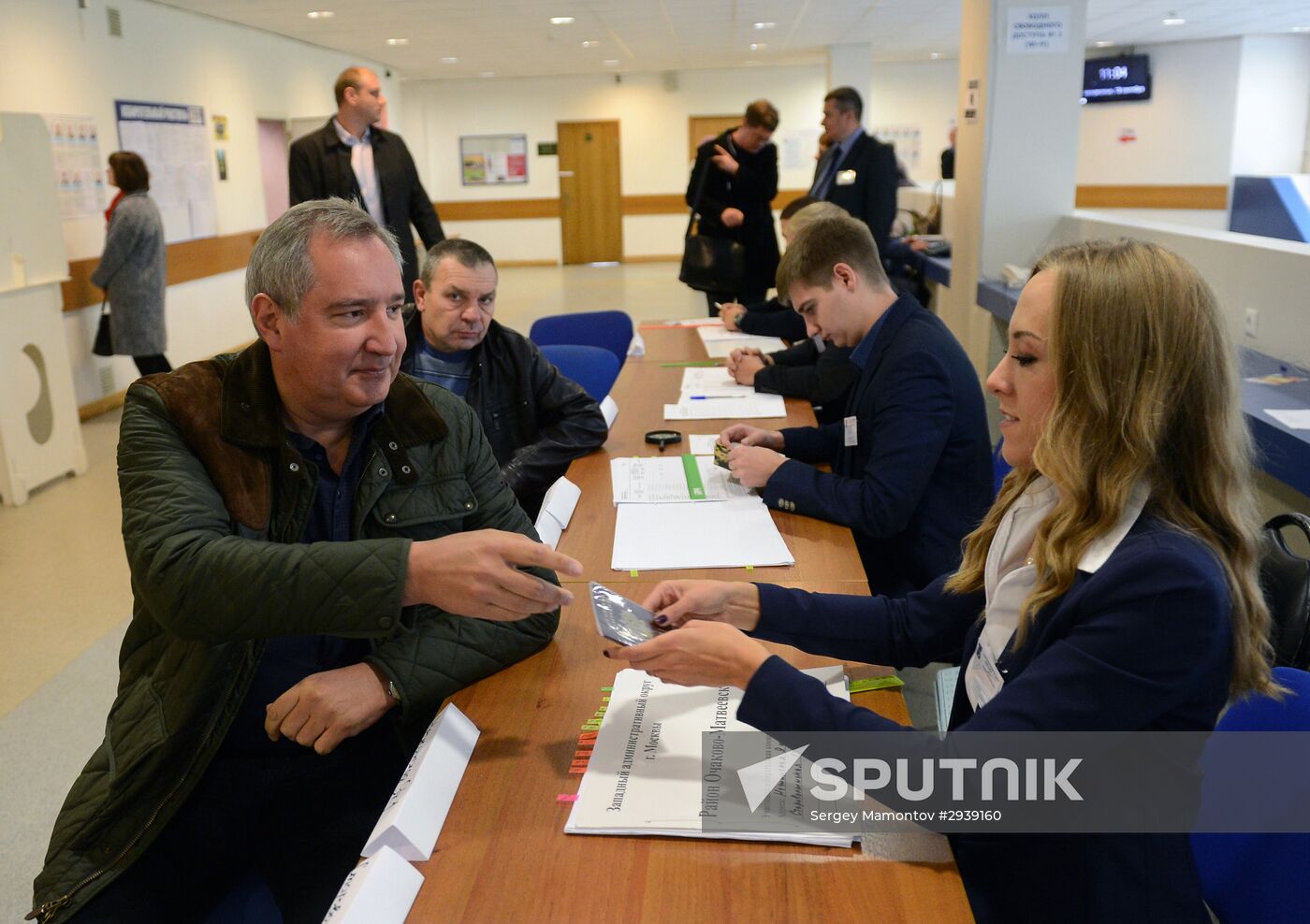 Public and political leaders vote on general election day