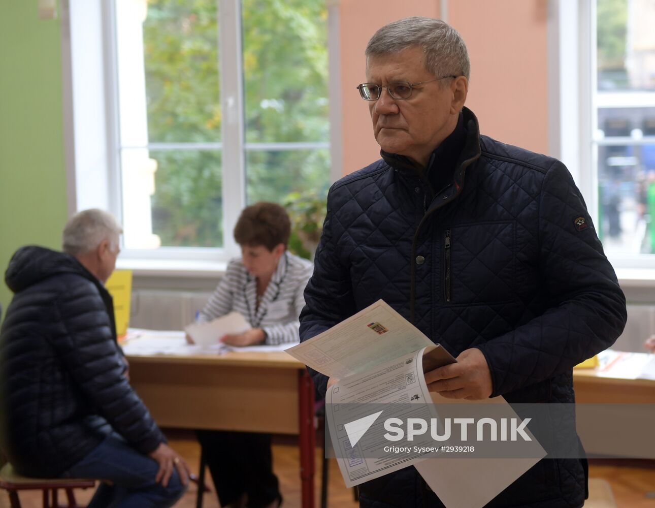 Public and political leaders vote on general election day