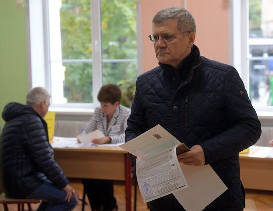 Public and political leaders vote on general election day