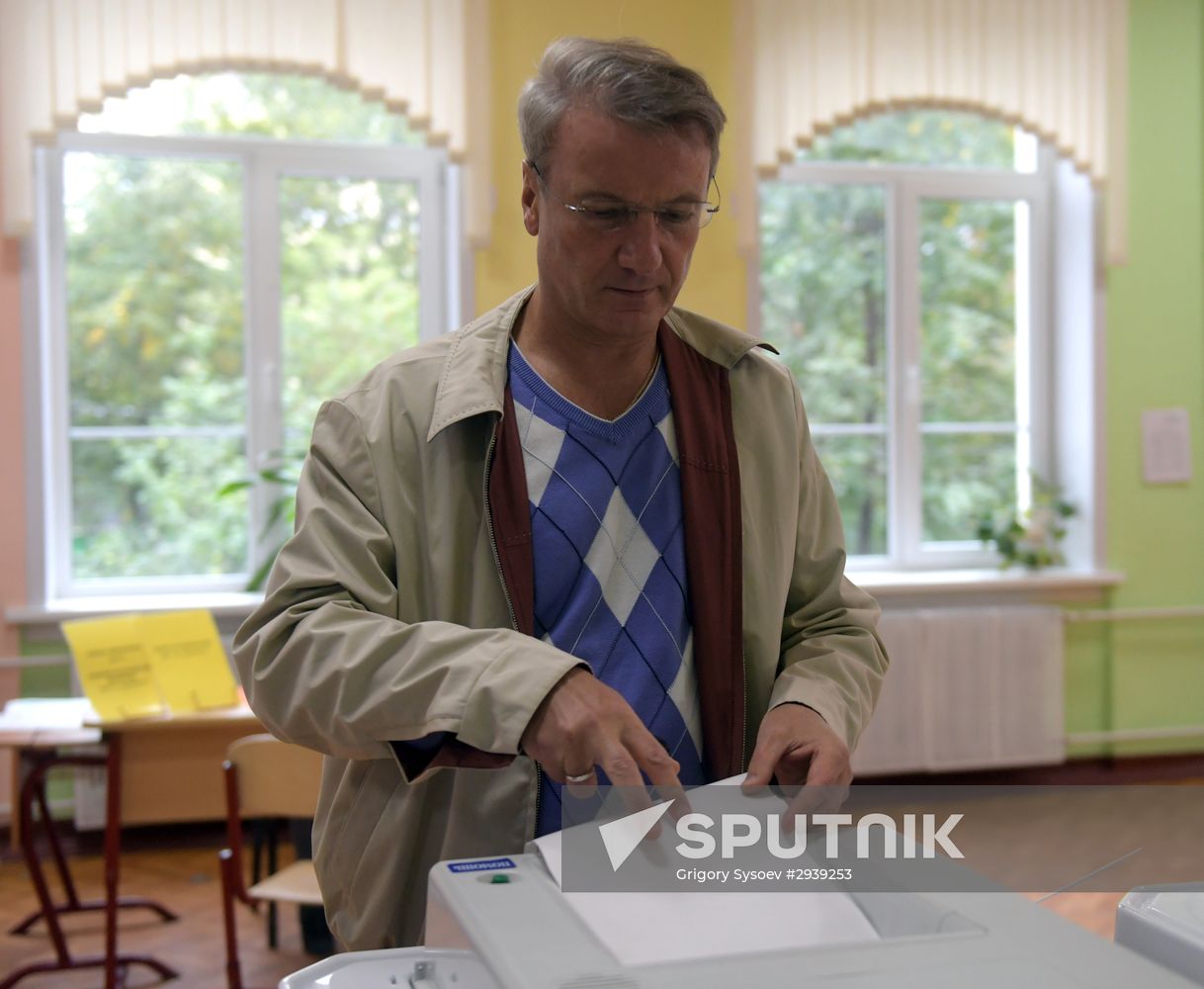 Public and political leaders vote on general election day