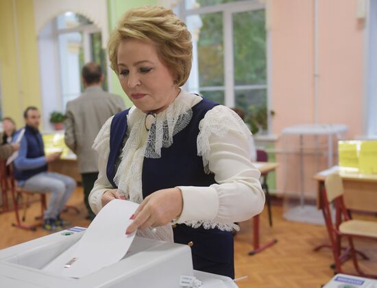 Public and political leaders vote on general election day