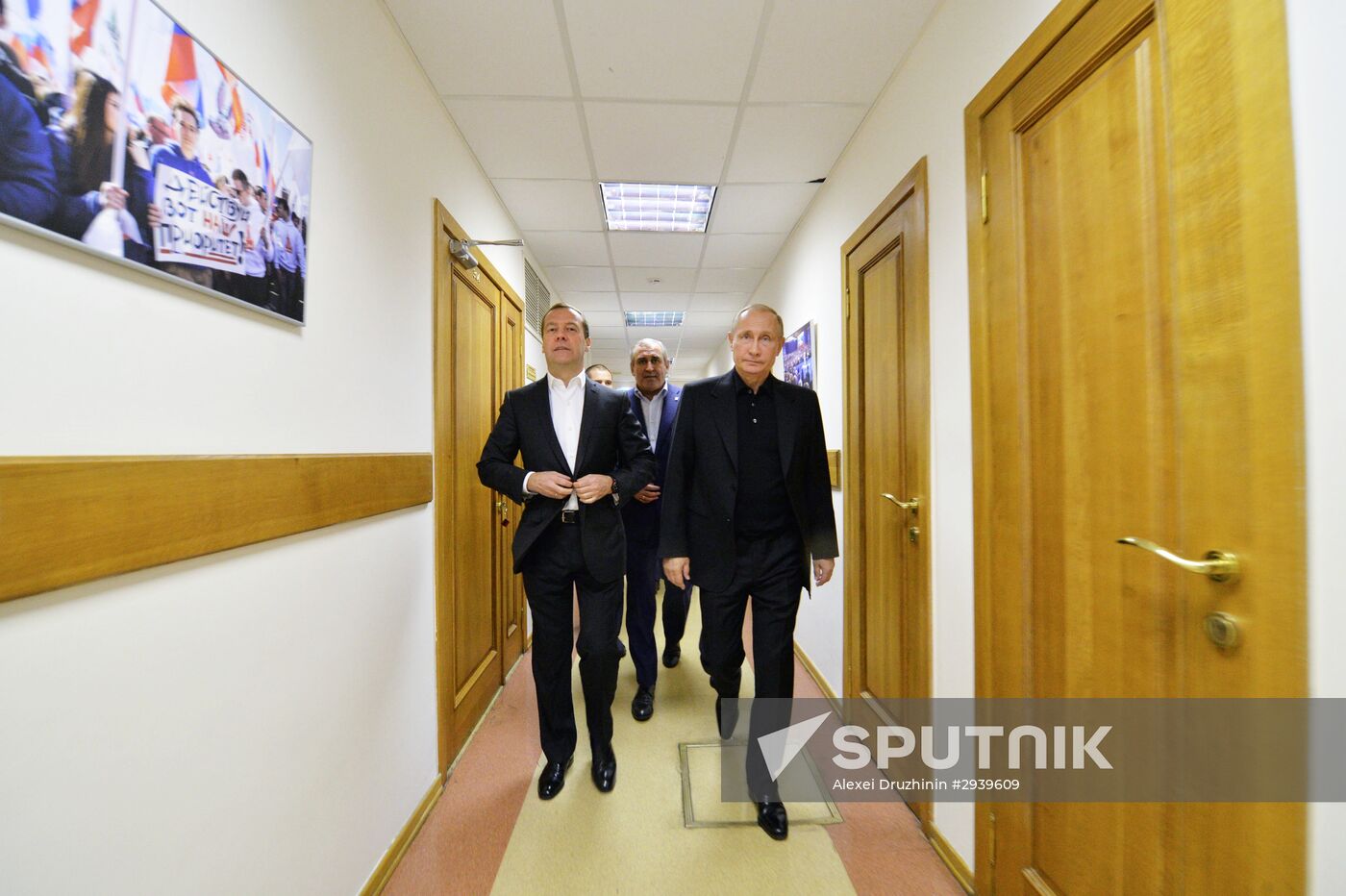 Vladimir Putin and Dmitry Medvedev visit United Russia party's election campaign headquarters