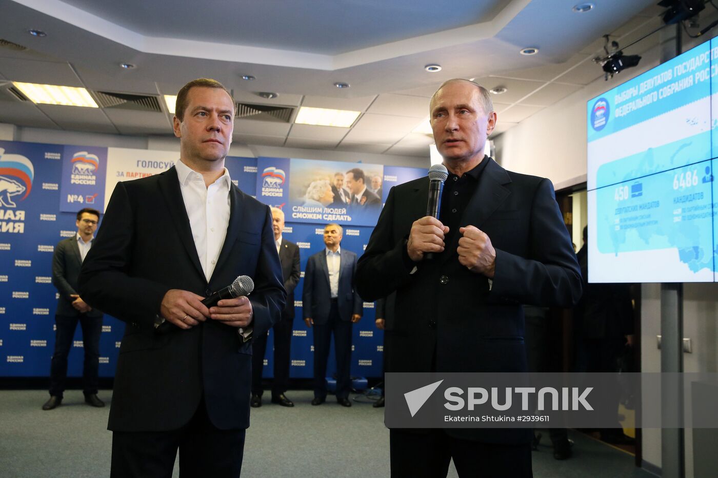 Vladimir Putin and Dmitry Medvedev visit United Russia party's election campaign headquarters