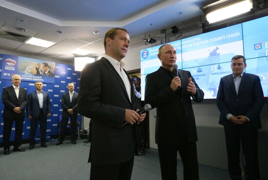 Vladimir Putin and Dmitry Medvedev visit United Russia party's election campaign headquarters