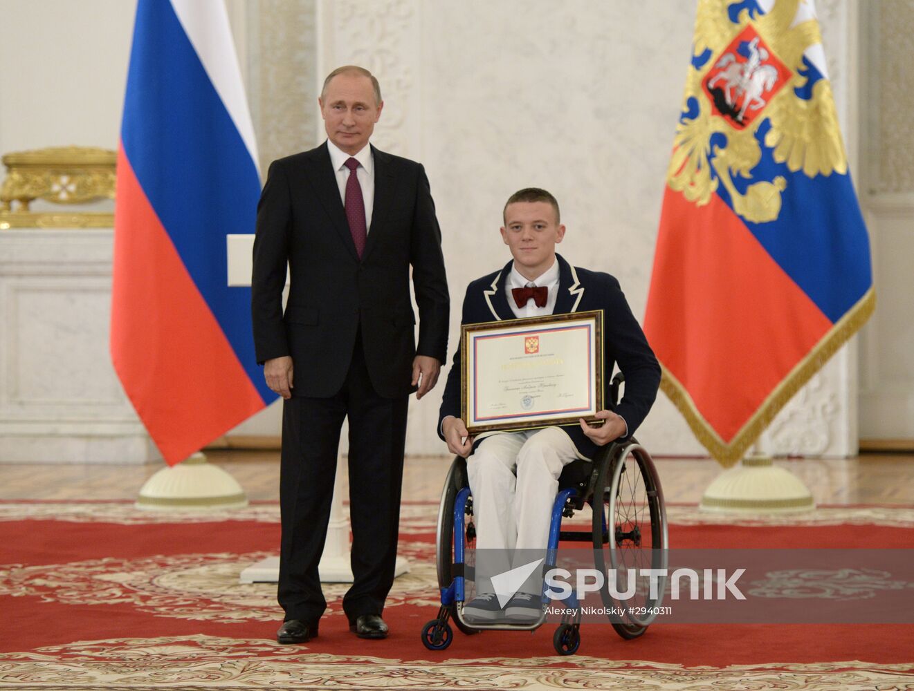 President Vladimir Putin meets with Russian Paralympic athletes in summer events