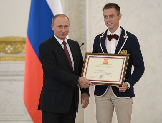President Vladimir Putin meets with Russian Paralympic athletes in summer events