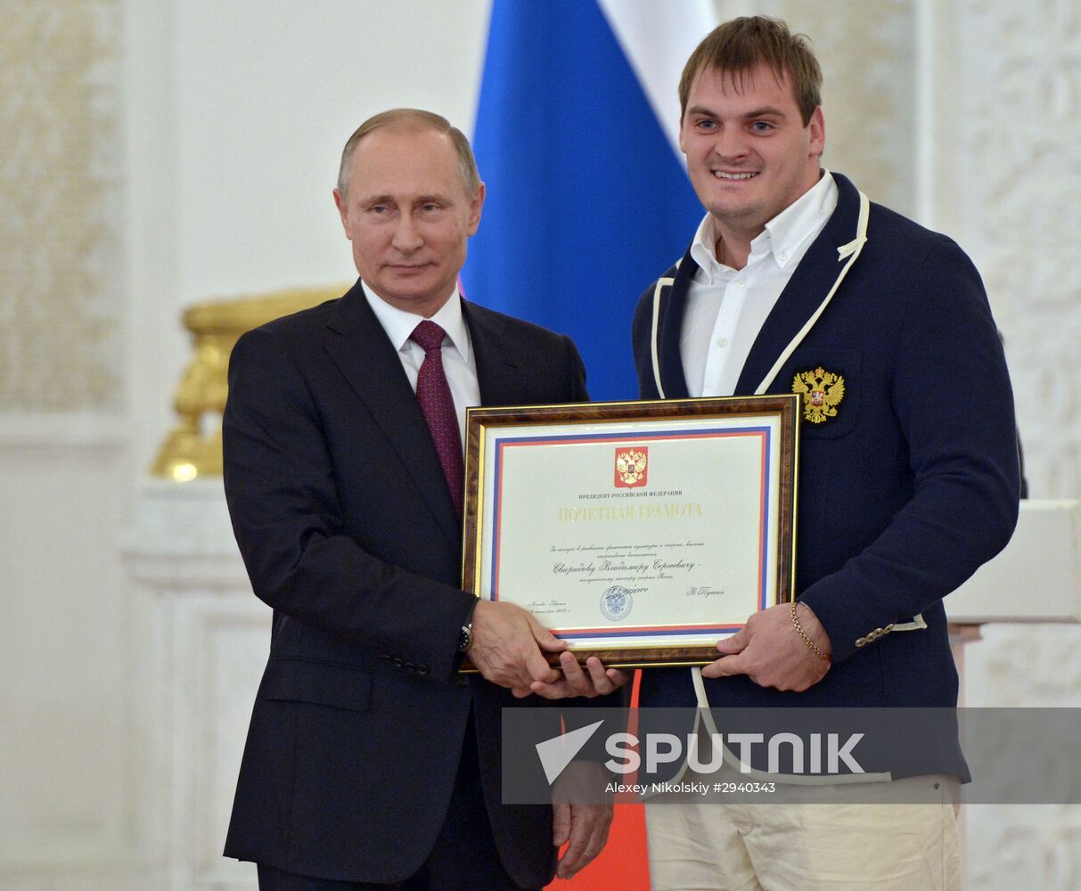 President Vladimir Putin meets with Russian Paralympic athletes in summer events