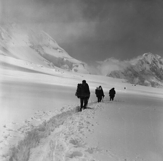Climbing the Communism Peak