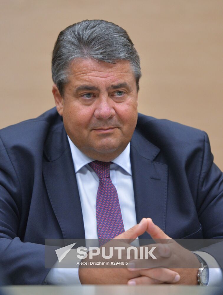 Vladimir Putin meets with German Vice Chancellor and Minister for Economic Affairs and Energy Sigmar Gabriel