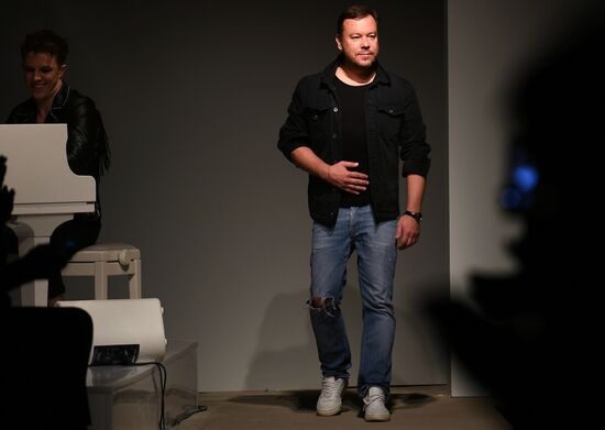 Fashion designer Igor Chapurin shows off his new collection