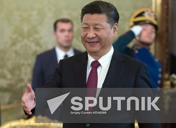 Vladimir Putin meets with Xi Jinping in Moscow