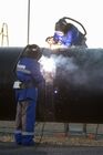 September 1, 2014. Welding the joint at the ceremony marking the joining of the first link in the Power of Siberia main gas pipeline attended by Russian President Vladimir Putin, held at Namsky Highway near Us Khatyn village. Location: Russia, Republic of Sakha (Yakutia). Author: Aleksey Nikolskyi/Sputnik. Vladimir Putin's working visit to Far Eastern Federal District