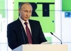 Vladimir Putin visits exhibition marking Russia Today news channel's 10th anniversary