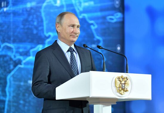 Russian President Vladimir Putin congratulates coal industry employees on Miner's Day