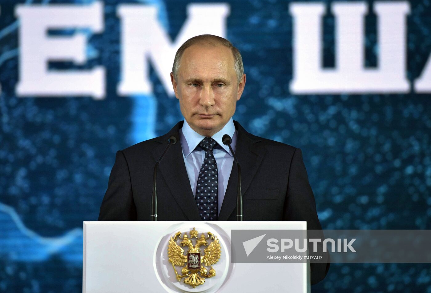 Russian President Vladimir Putin congratulates coal industry employees on Miner's Day