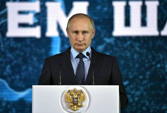 Russian President Vladimir Putin congratulates coal industry employees on Miner's Day