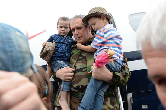 Children saved in Iraq are welcomed at Grozny Airport