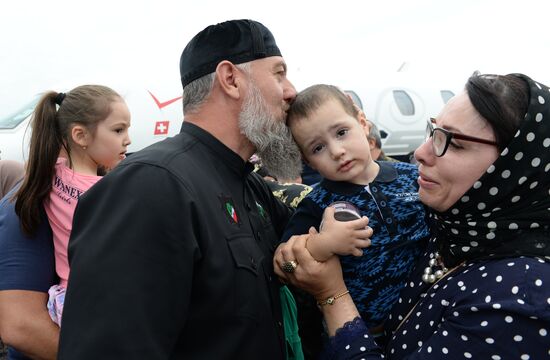 Children saved in Iraq are welcomed at Grozny airport