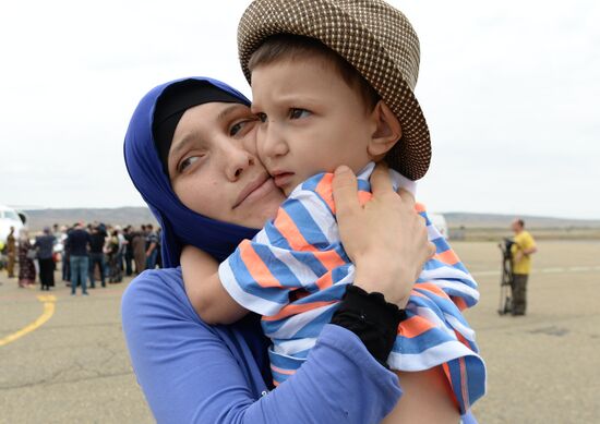 Children saved in Iraq are welcomed at Grozny airport