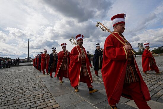 Procession by participants in Spasskaya Tower festival