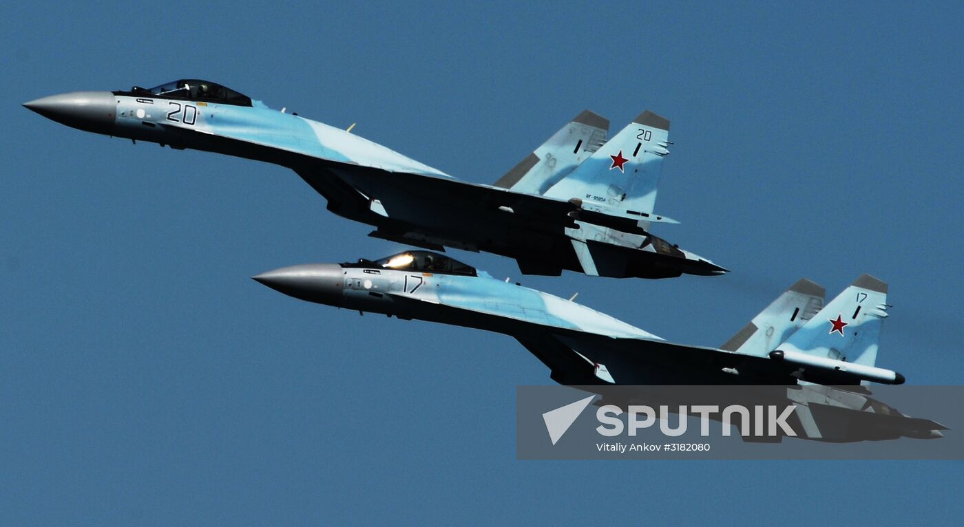 A Su-35C fighter of the Eastern Military District during a training flight over the Ajax Bay in Vladivostok. The aircraft will perform aerobatics during the opening of the third Eastern Economic Forum. Location: Russia, Primorsky krai region, Vladivostok. Author: Vitaliy Ankov/Sputnik. Preparation for Eastern Economic Forum