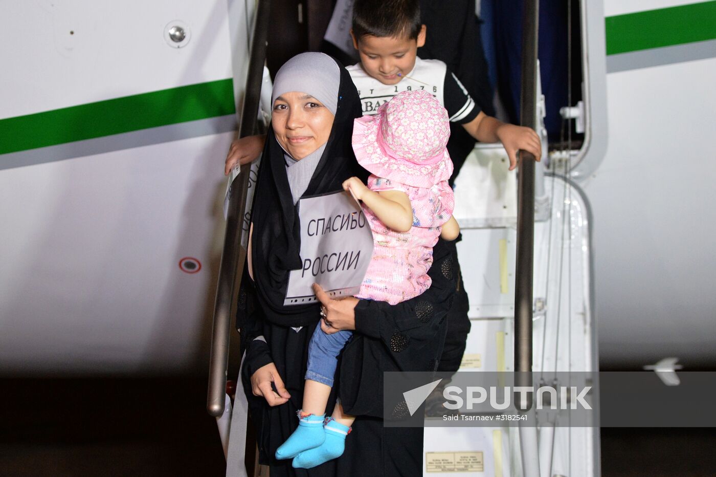 Russian children saved from Iraq arrive in Grozny