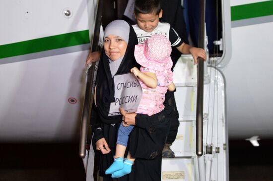 Russian children saved from Iraq arrive in Grozny