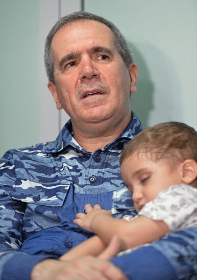 Russian children saved from Iraq arrive in Grozny