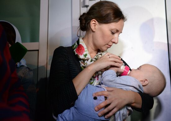 Russian children saved from Iraq arrive in Grozny