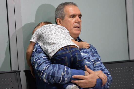 Russian children saved from Iraq arrive in Grozny