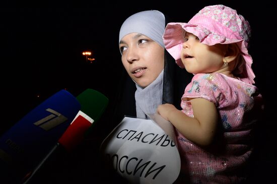 Russian children saved from Iraq arrive in Grozny