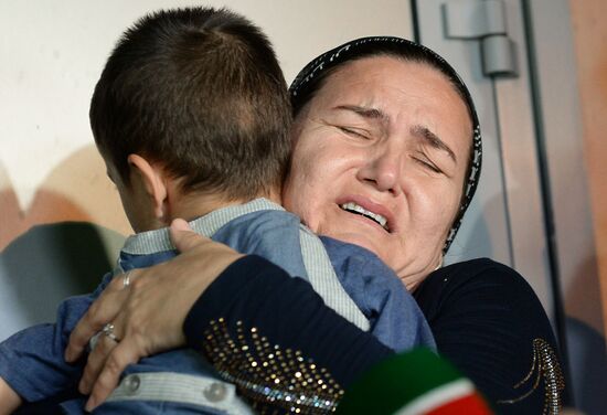 Russian children saved from Iraq arrive in Grozny