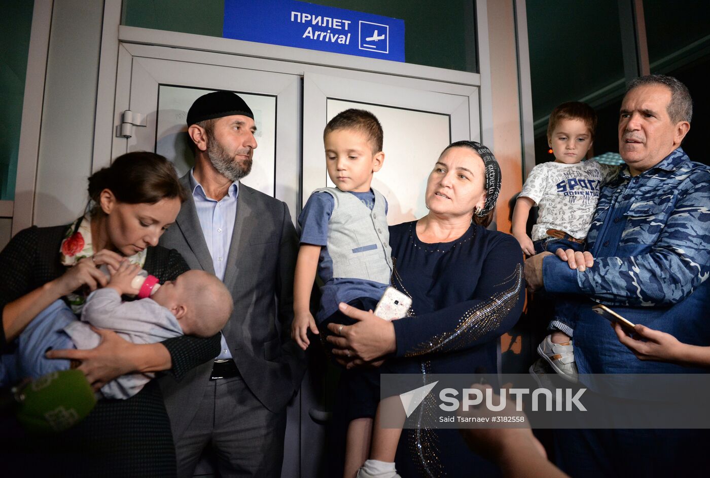 Russian children saved from Iraq arrive in Grozny