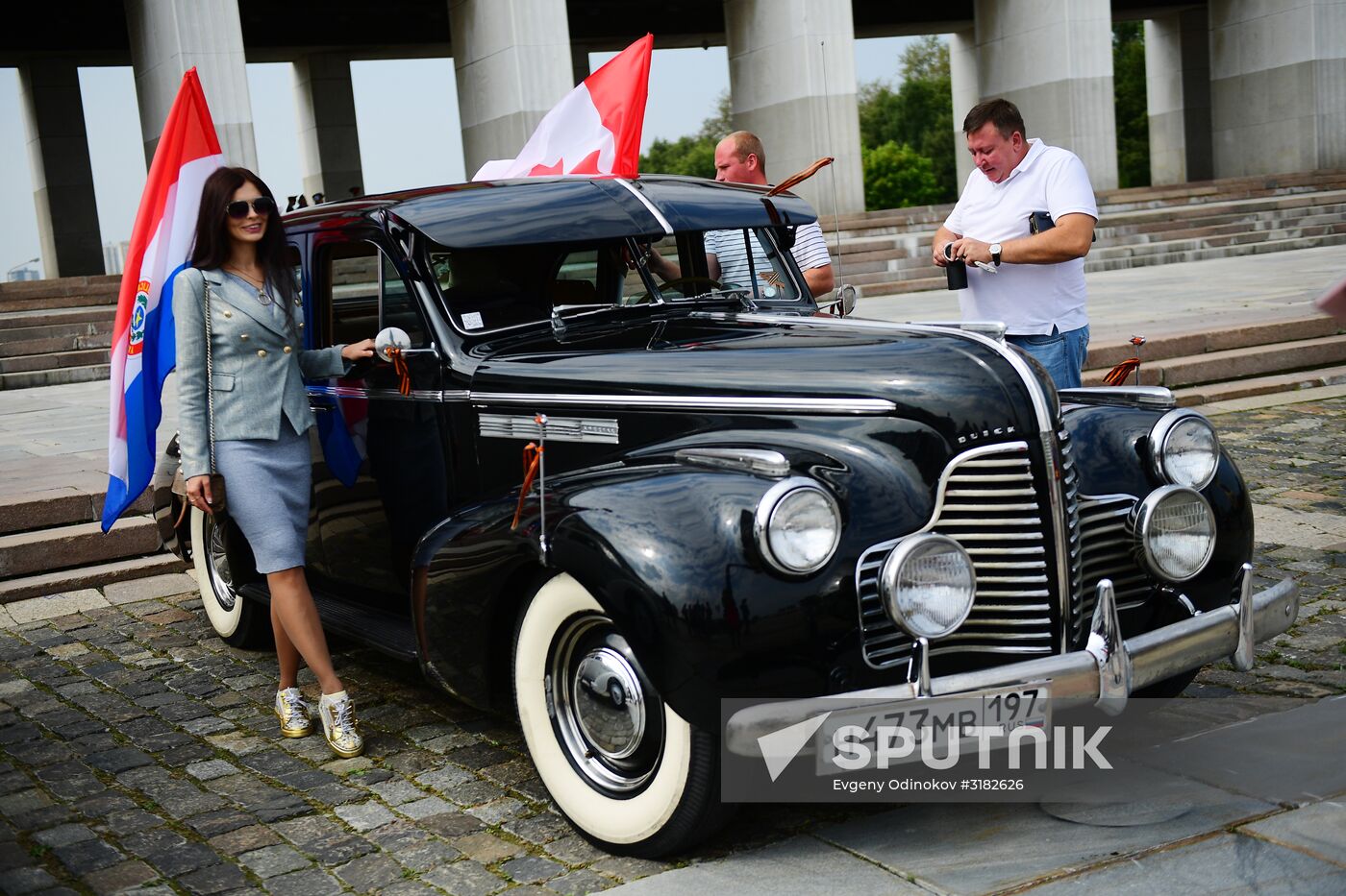 Parade of Pobeda cars