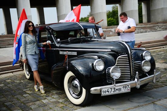 Parade of Pobeda cars