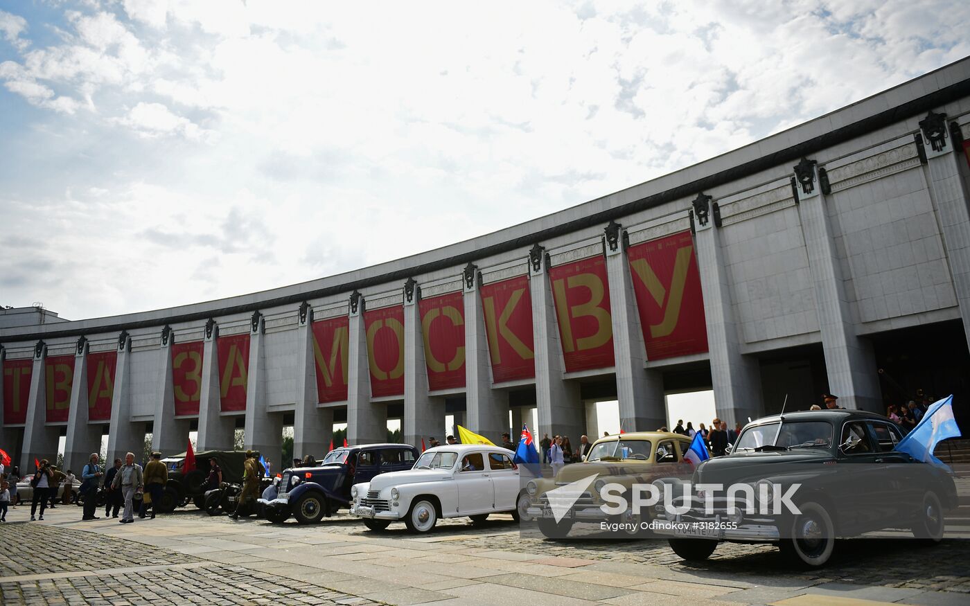 Parade of Pobeda cars