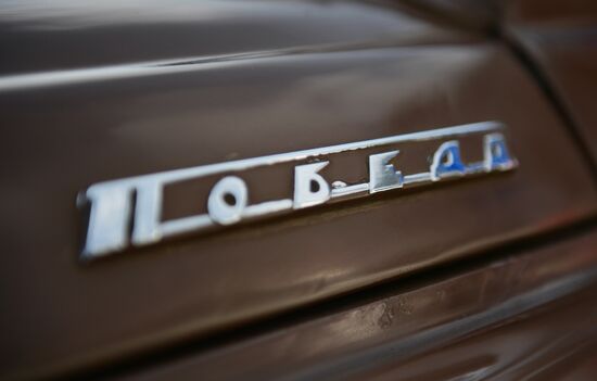 Parade of Pobeda cars