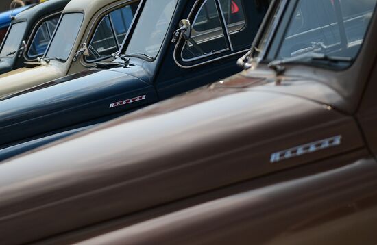 Parade of Pobeda cars