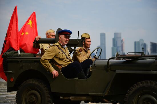 Parade of Pobeda cars