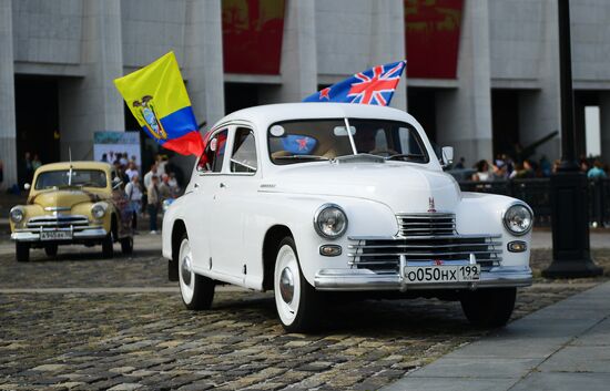 Parade of Pobeda cars