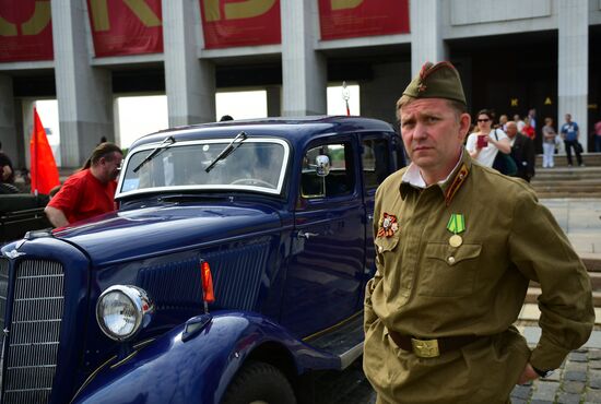 Parade of Pobeda cars